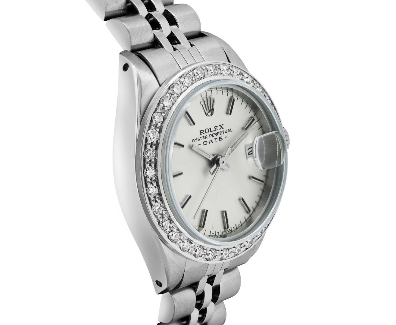 Rolex Ladies Stainless Steel Silver Index Diamond Bezel Date Wristwatch