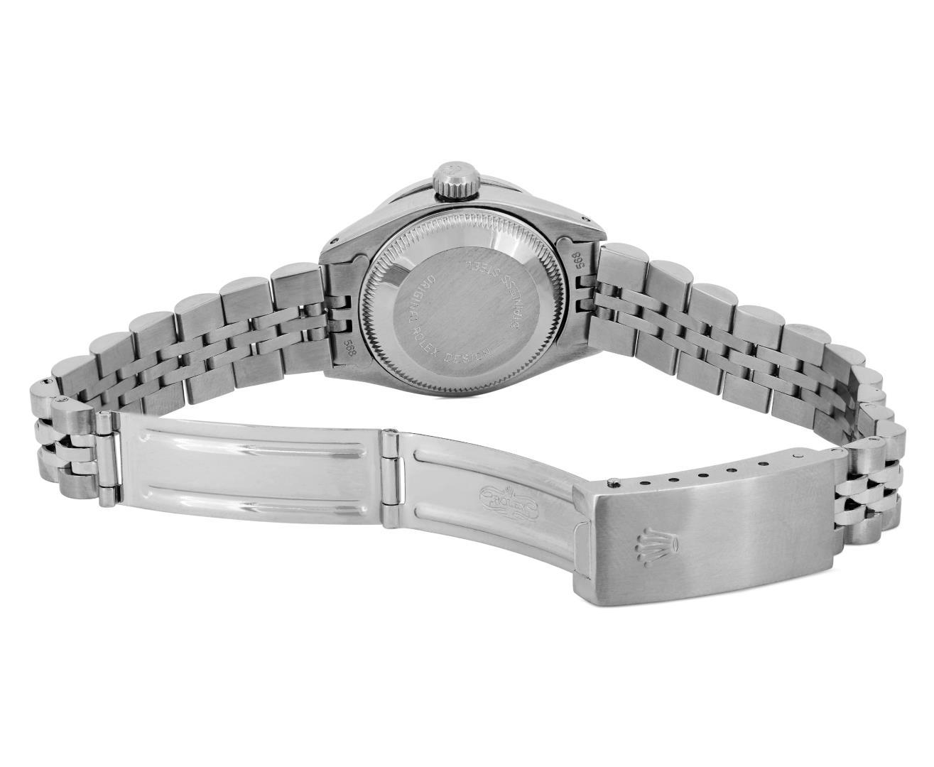 Rolex Ladies Stainless Steel Silver Index Diamond Bezel Date Wristwatch