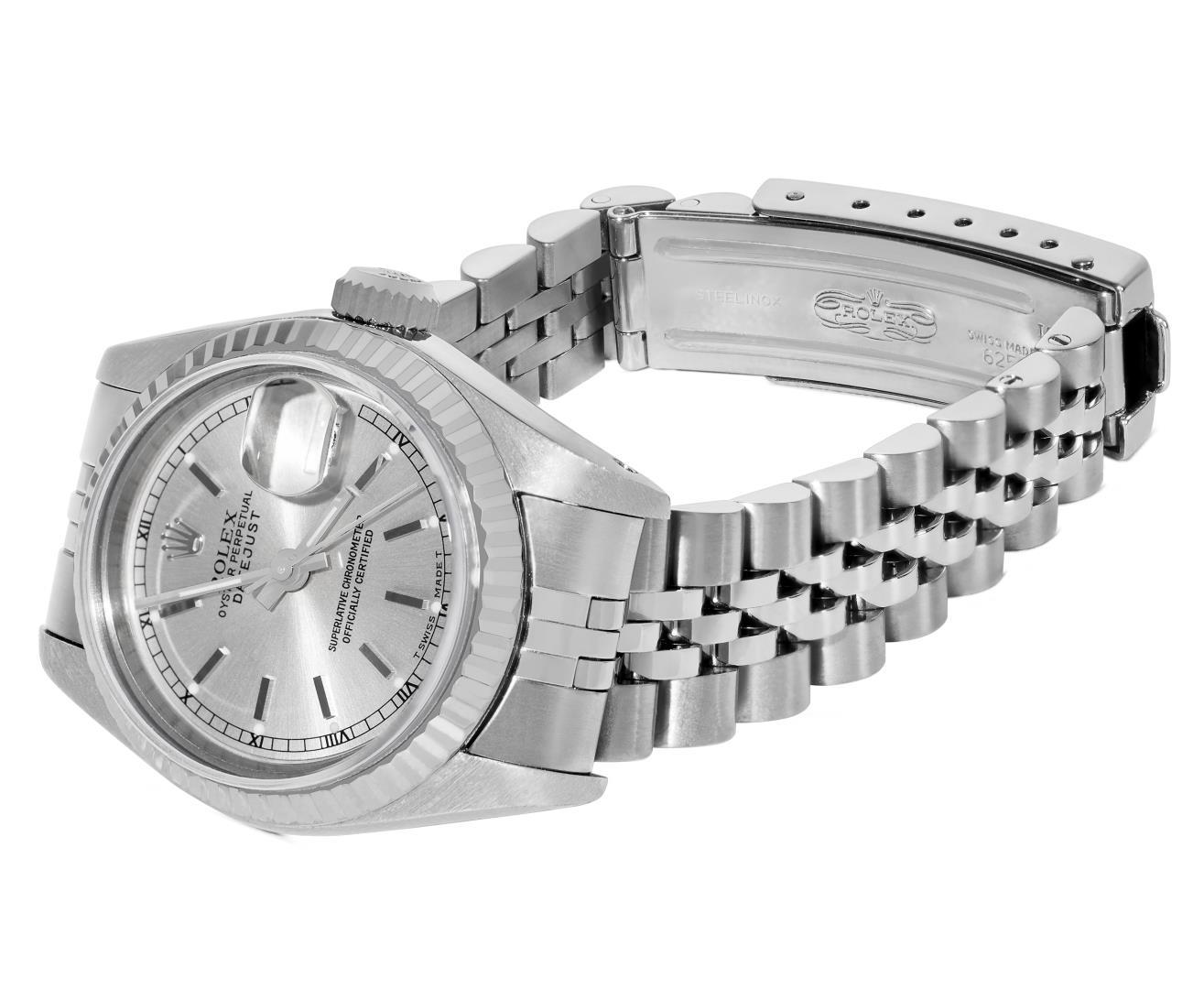 Rolex Ladies Stainless Steel Quickset Silver Index Fluted Bezel Datejust With Ro