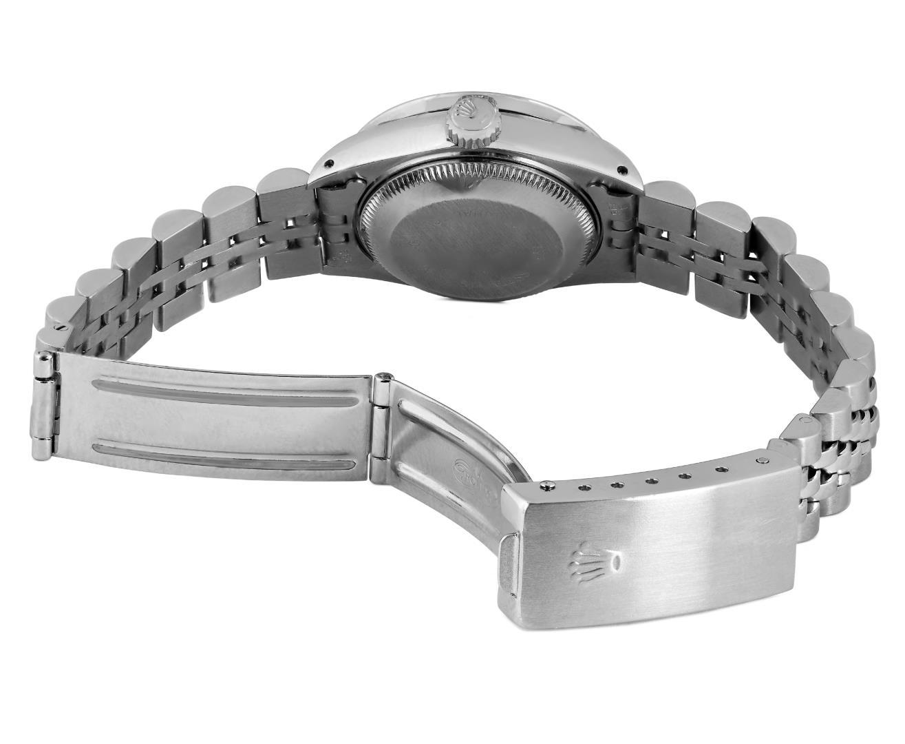 Rolex Ladies Stainless Steel Quickset Silver Index Diamond Bezel Date Watch With