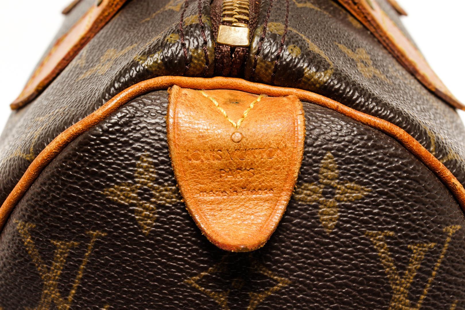 Louis Vuitton Monogram Speedy 25 Handbag