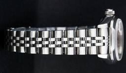 Rolex Ladies Stainless Steel Silver Index Smooth Bezel Quickset Date Wristwatch