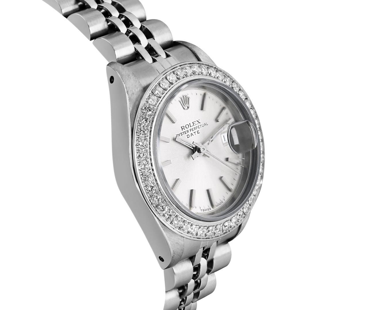 Rolex Ladies Stainless Steel Quickset Silver Index Diamond Bezel Date Watch With