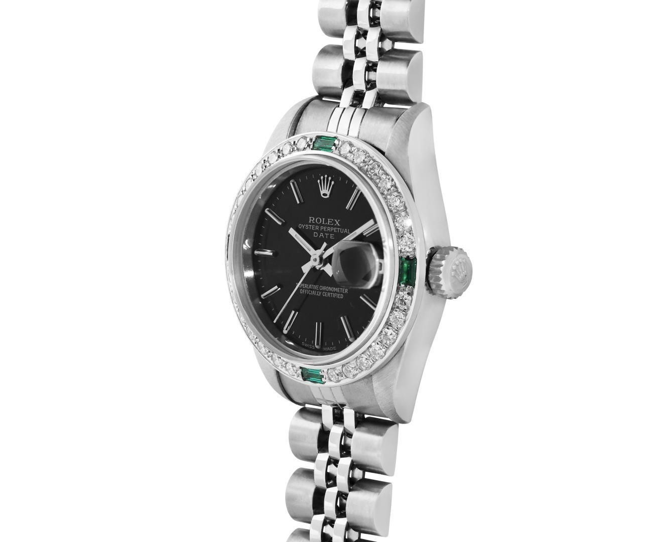 Rolex Ladies Stainless Steel Black Index Dial Diamond And Emerald Bezel Date Wri