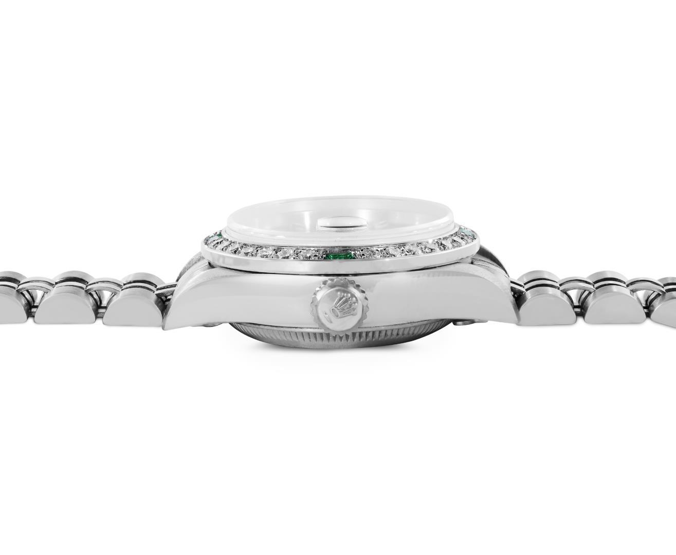Rolex Ladies Stainless Steel Black Index Dial Diamond And Emerald Bezel Date Wri