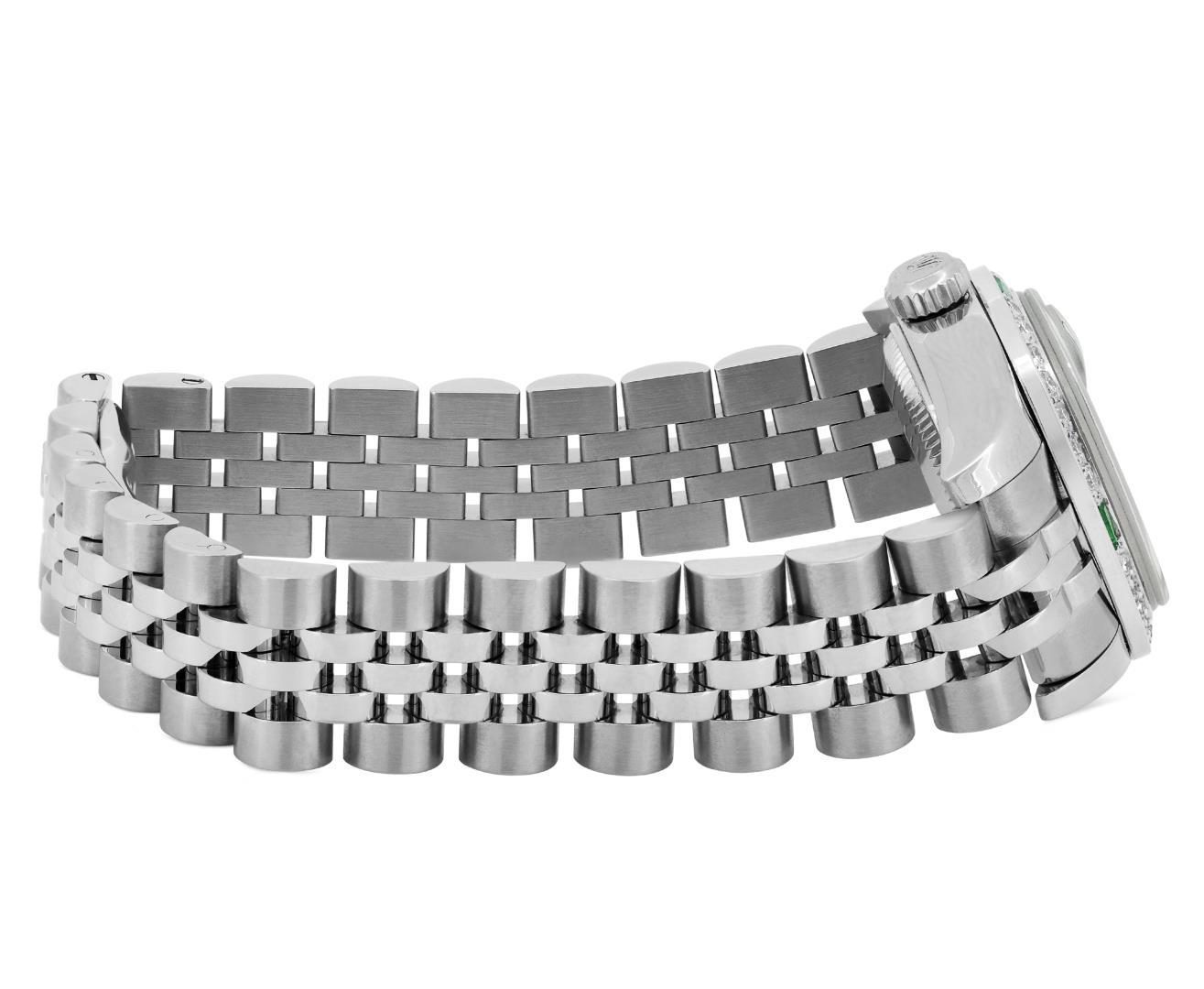 Rolex Ladies Quickset Black Index White Gold Emerald And Diamond Bezel With Hidd