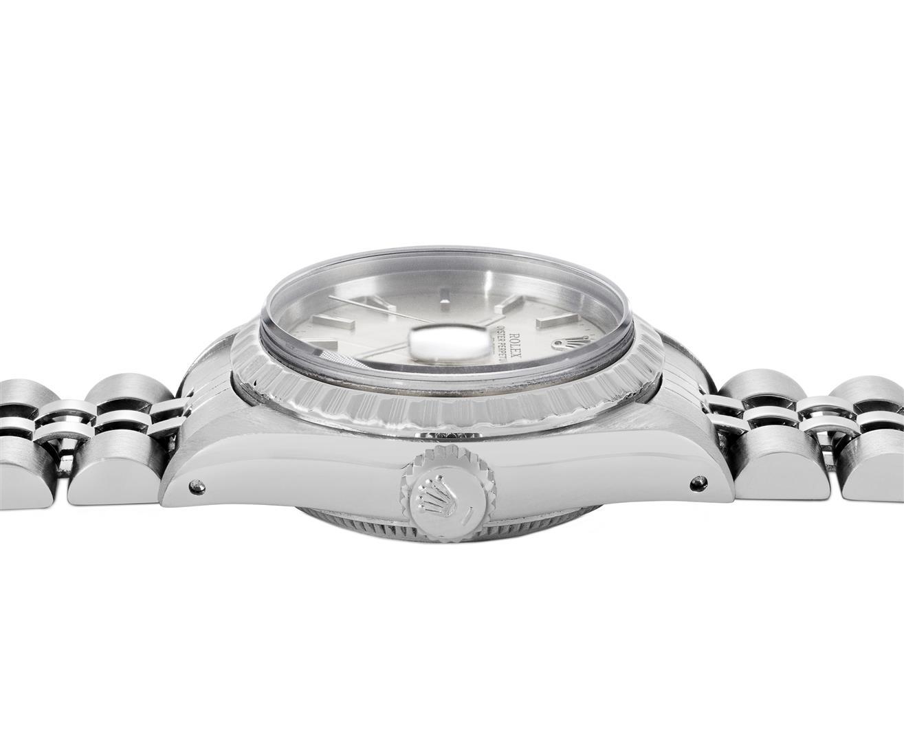 Rolex Ladies Quickset Stainless Steel Silver Index Engine Turn Bezel Date Watch
