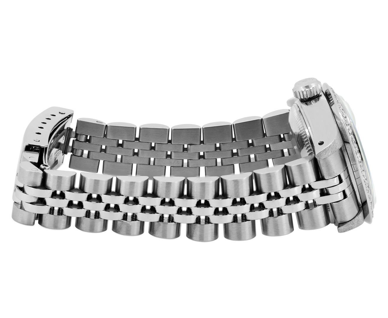 Rolex Ladies Stainless Steel Quickset Silver Index Diamond Bezel Date Watch With