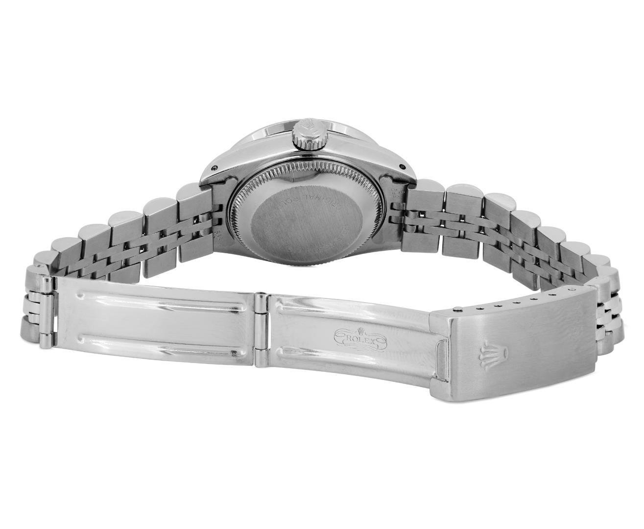 Rolex Ladies Stainless Steel Quickset Silver Index Diamond Bezel Date Watch With