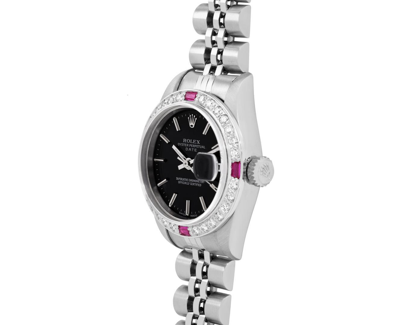 Rolex Ladies Stainless Steel Black Index Dial Diamond And Ruby Bezel Date Wristw