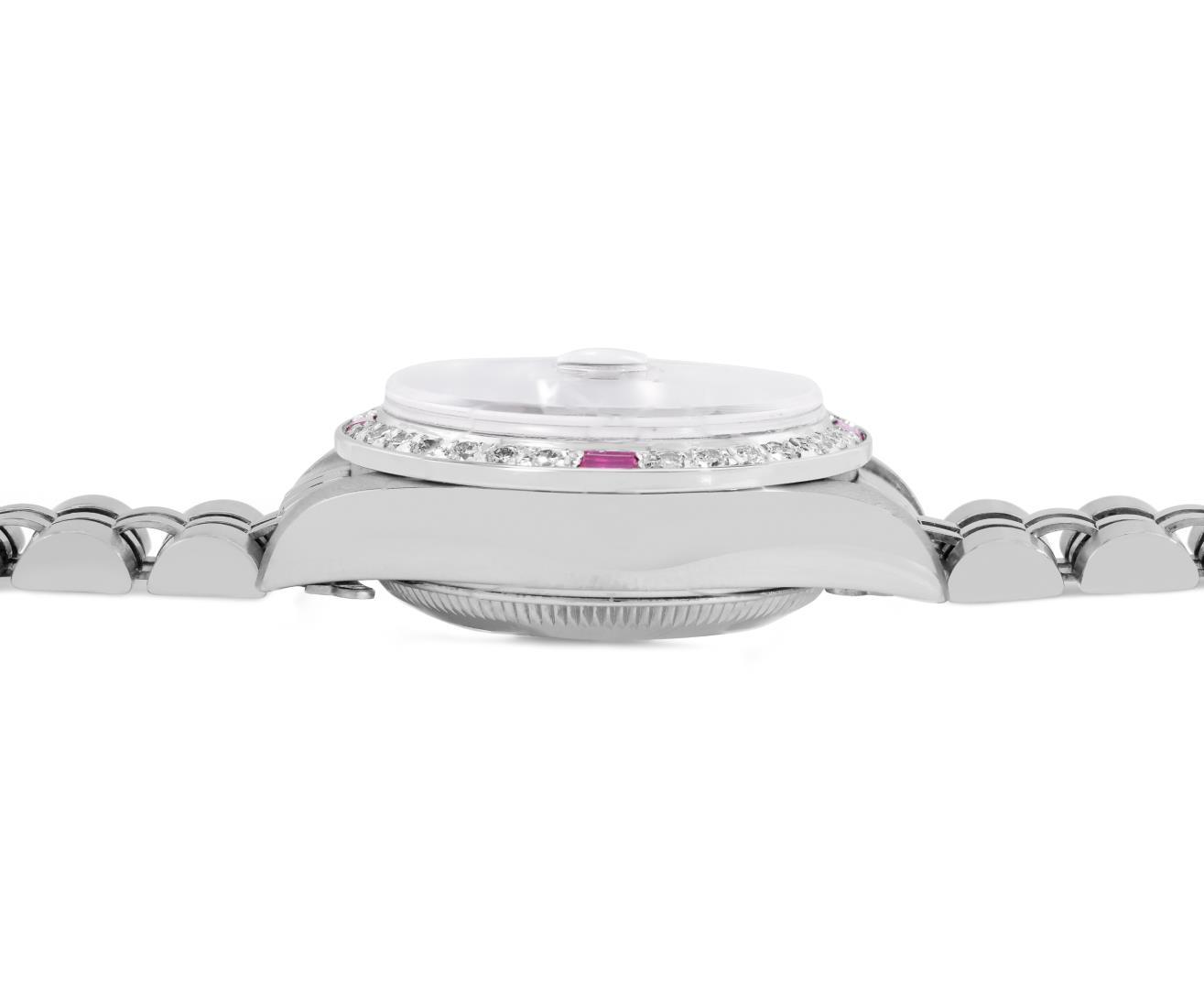 Rolex Ladies Stainless Steel Black Index Dial Diamond And Ruby Bezel Date Wristw