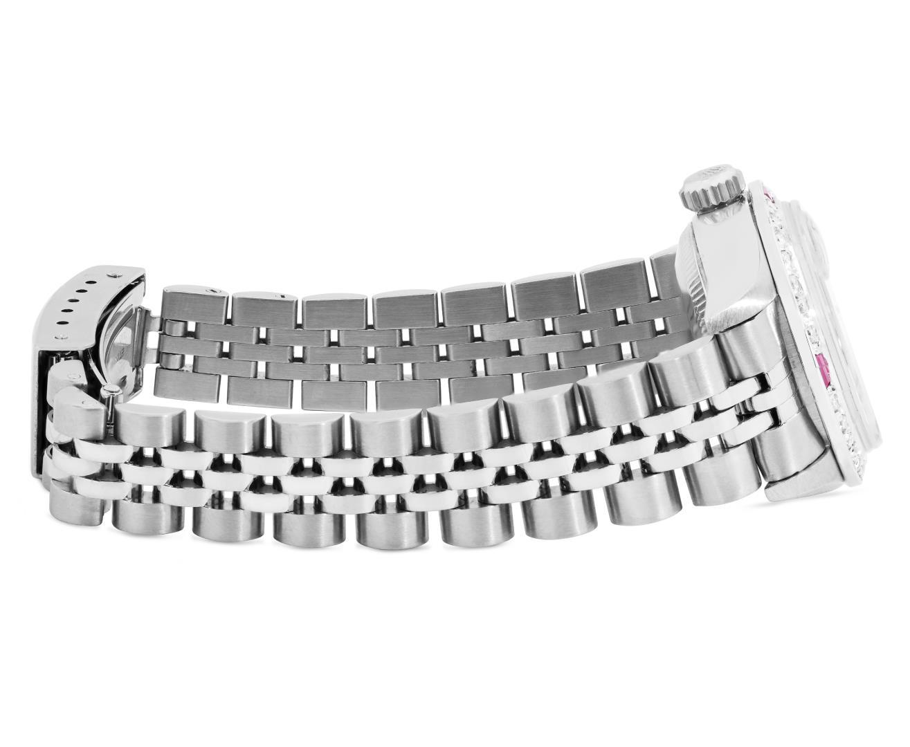 Rolex Ladies Stainless Steel Black Index Dial Diamond And Ruby Bezel Date Wristw
