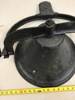 Vintage cast iron bell with clapper and bracket
