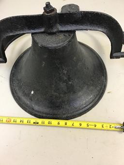 Vintage cast iron bell with clapper and bracket