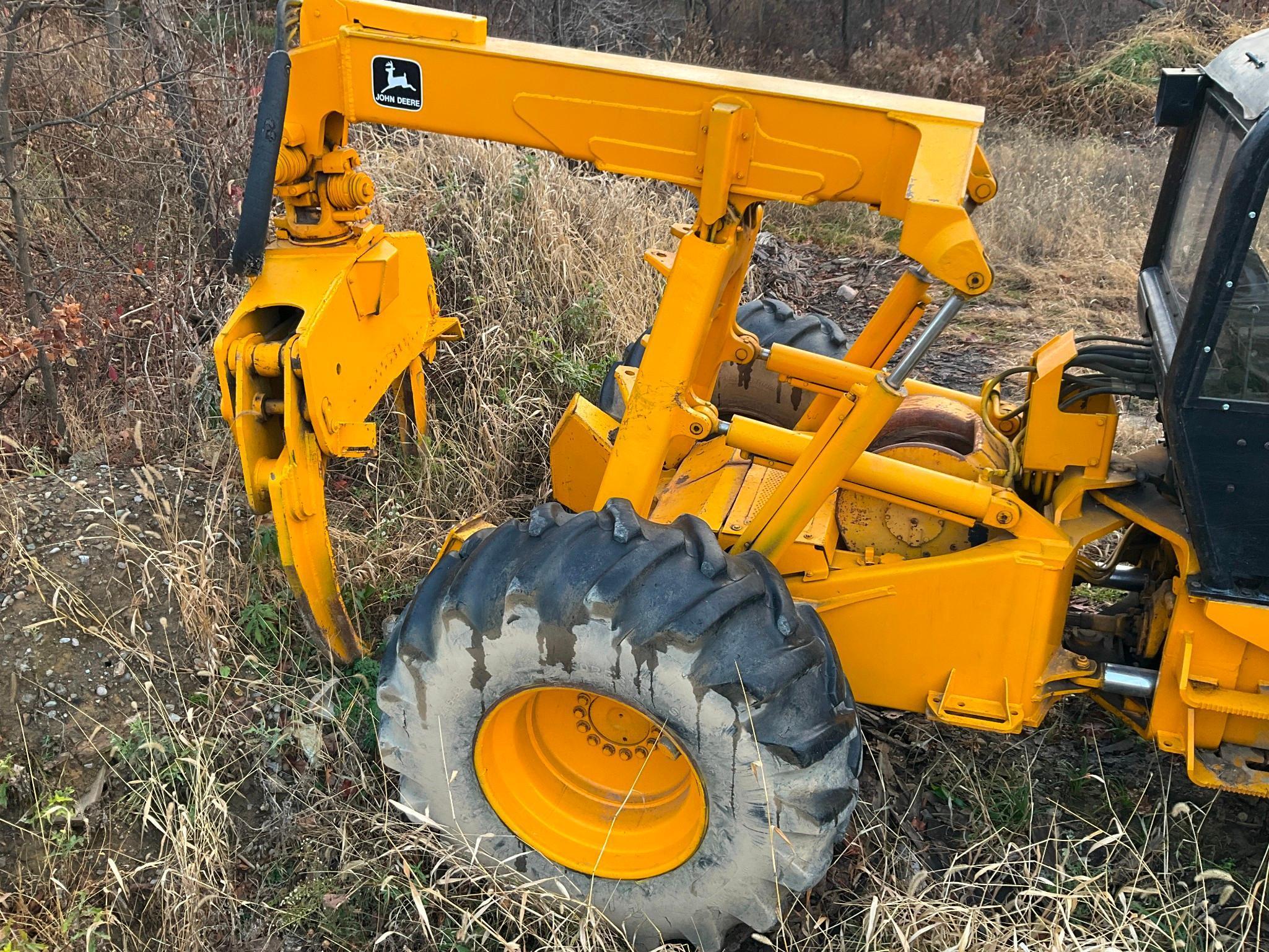 (INV50016) John Deere Model 740A Grabble Skidder With Winch