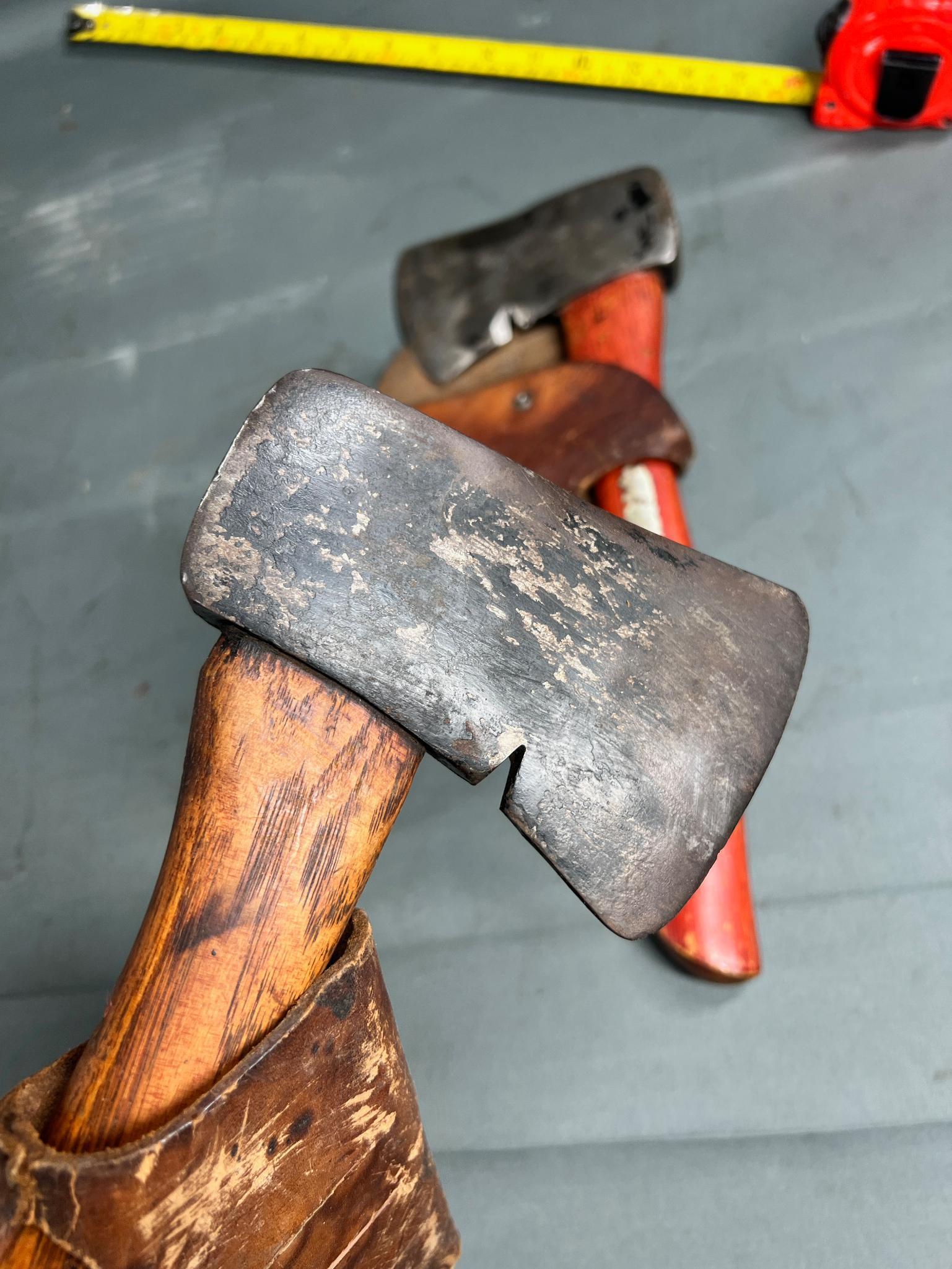 2- Plumb Hatchets, both with leather covers, handles appear original