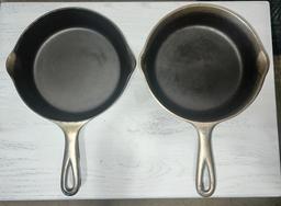No. 5 Wagner Plated and Wapak no. 5 Plated cast iron skillets, both w/ heat rings