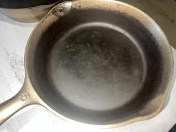 No. 5 Wagner Plated and Wapak no. 5 Plated cast iron skillets, both w/ heat rings