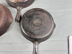 3- Griswold Cast Iron Skillets, No. 7 and 9 Small Block, and Slant no. 8 (slight wobble to no. 8)