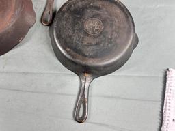 3- Griswold Cast Iron Skillets, No. 7 and 9 Small Block, and Slant no. 8 (slight wobble to no. 8)