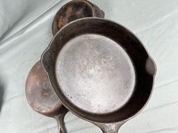 3- Griswold Cast Iron Skillets, No. 7 and 9 Small Block, and Slant no. 8 (slight wobble to no. 8)