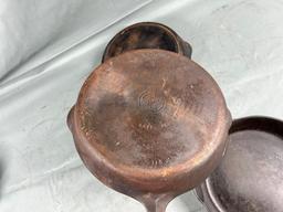 3- Griswold Cast Iron Skillets, No. 7 and 9 Small Block, and Slant no. 8 (slight wobble to no. 8)
