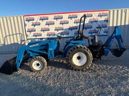 New Holland TC30 Tractor, bucket & backhoe 2278 hrs., SN 324596 on bucket