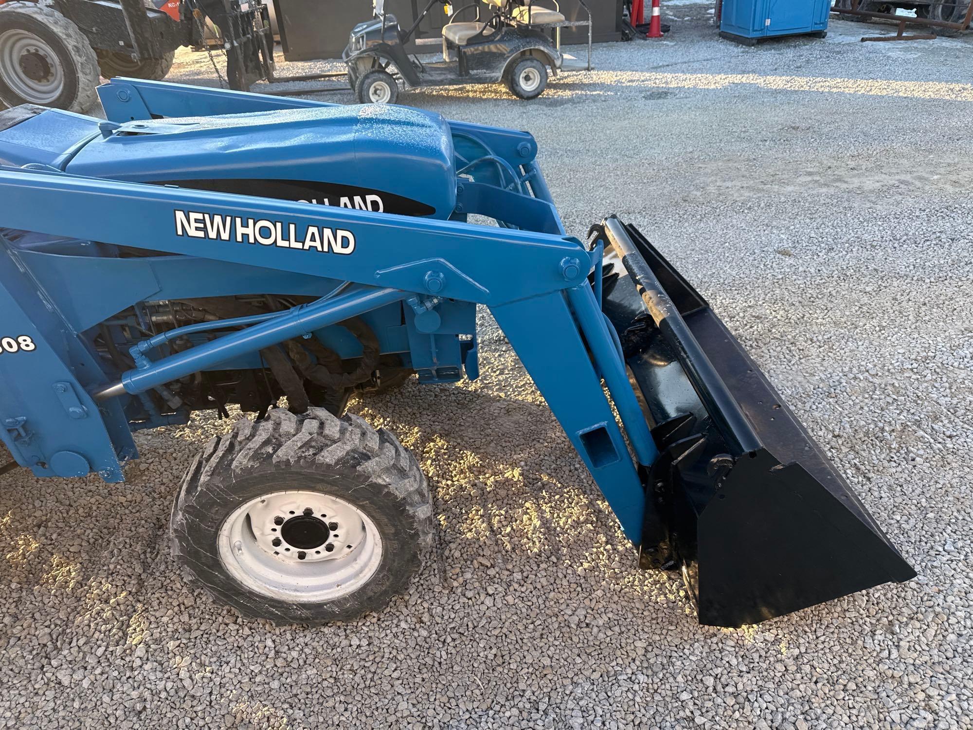 New Holland TC30 Tractor, bucket & backhoe 2278 hrs., SN 324596 on bucket