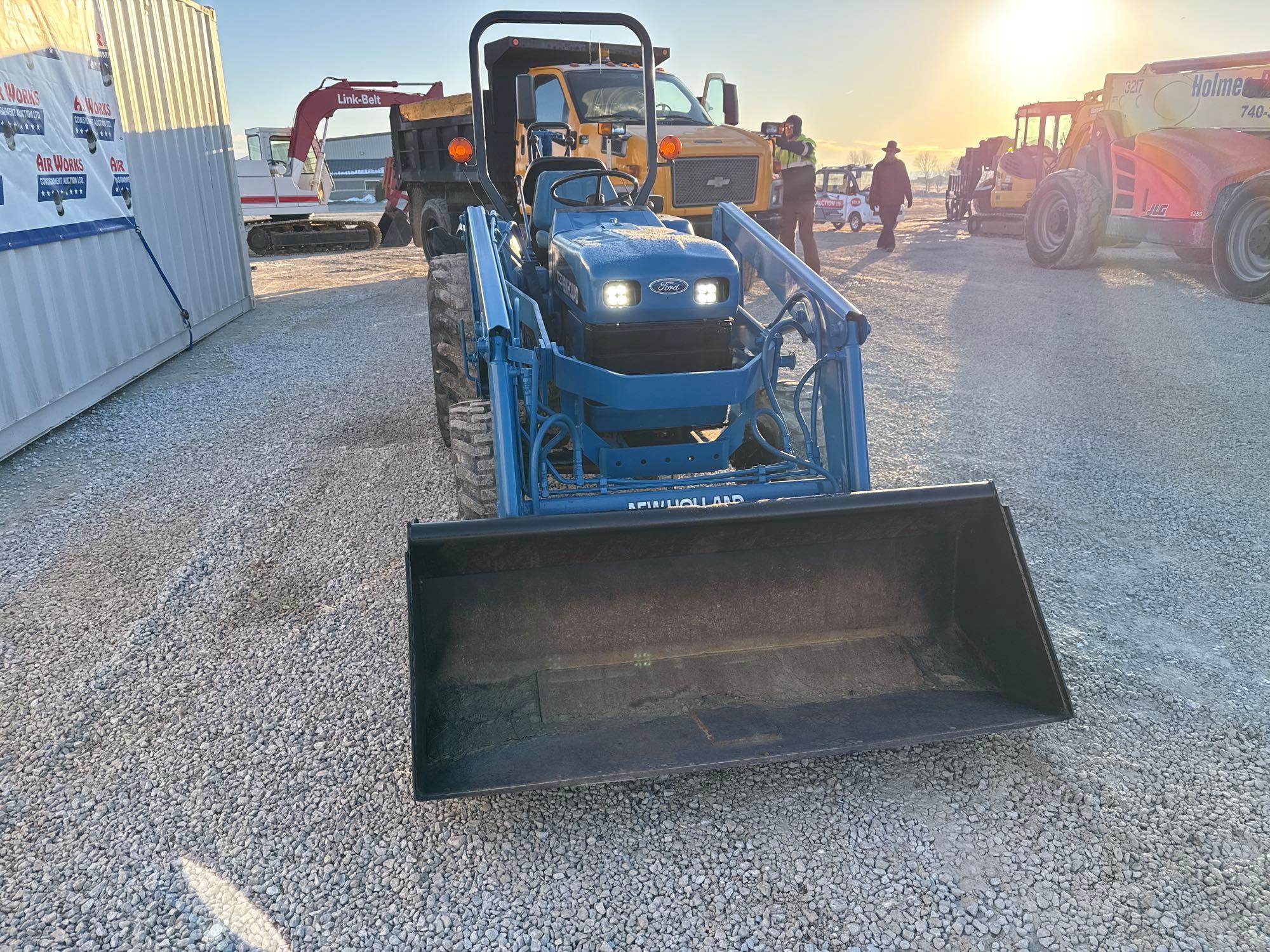 New Holland TC30 Tractor, bucket & backhoe 2278 hrs., SN 324596 on bucket