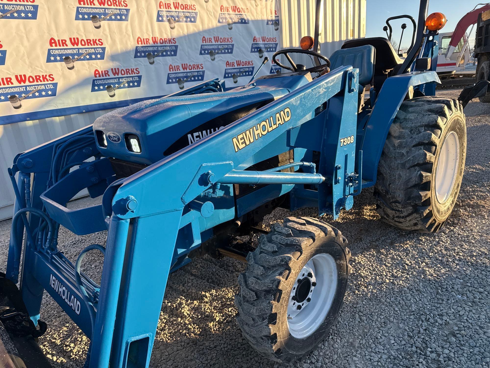 New Holland TC30 Tractor, bucket & backhoe 2278 hrs., SN 324596 on bucket