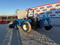 New Holland TC30 Tractor, bucket & backhoe 2278 hrs., SN 324596 on bucket