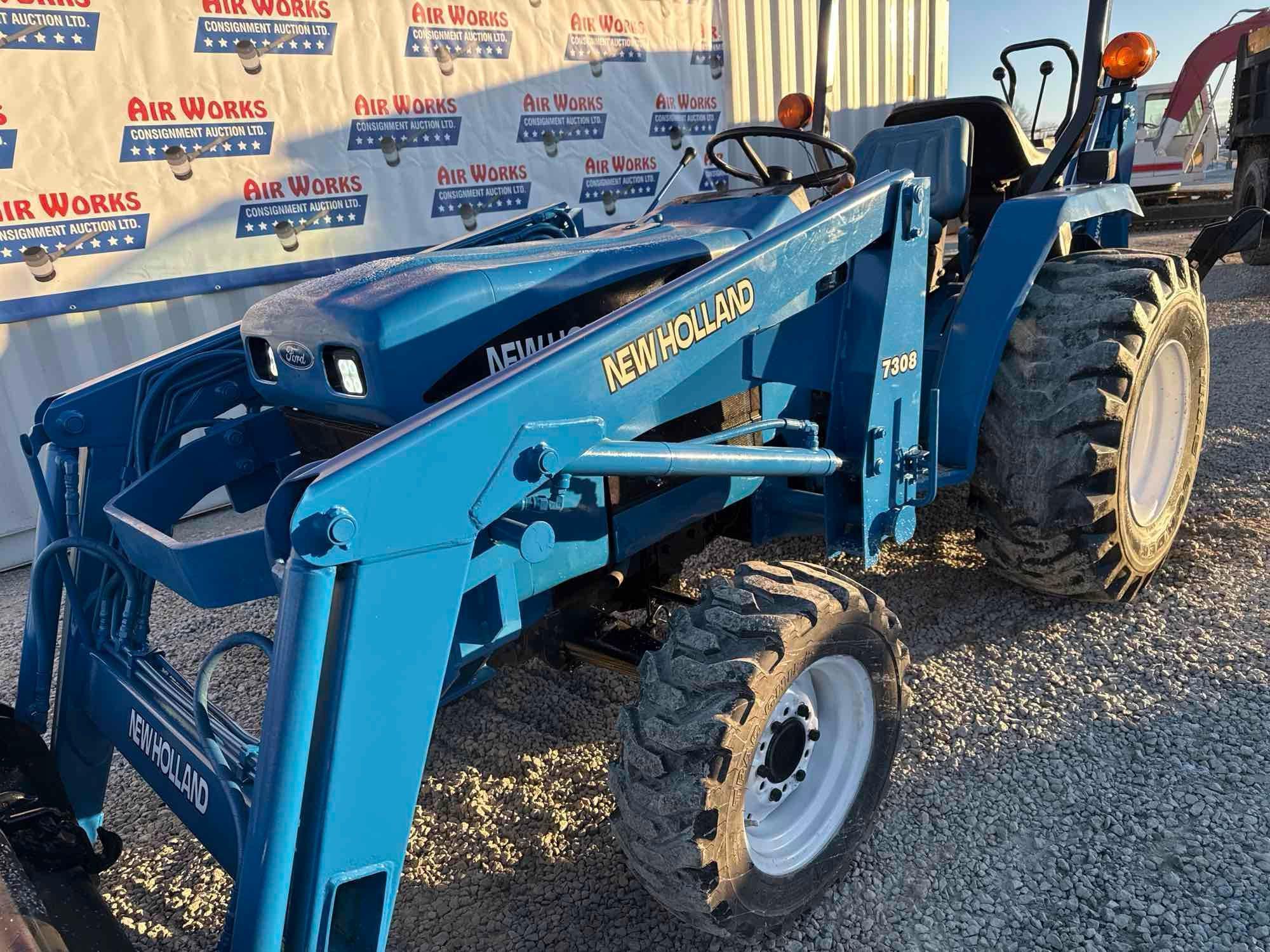 New Holland TC30 Tractor, bucket & backhoe 2278 hrs., SN 324596 on bucket
