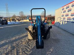 New Holland TC30 Tractor, bucket & backhoe 2278 hrs., SN 324596 on bucket