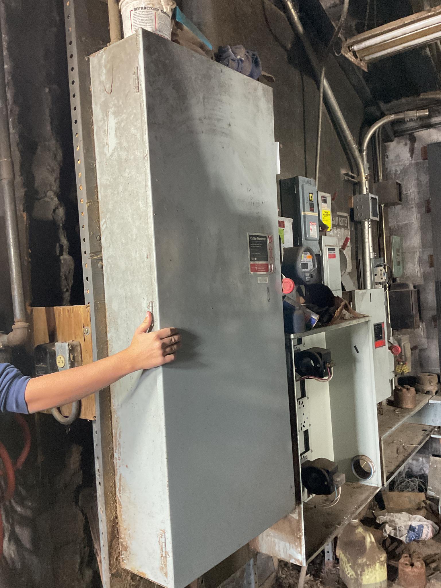 Control Panels and Breaker Boxes Mounted on 2 Walls, Located In Heuvelton, Ny.