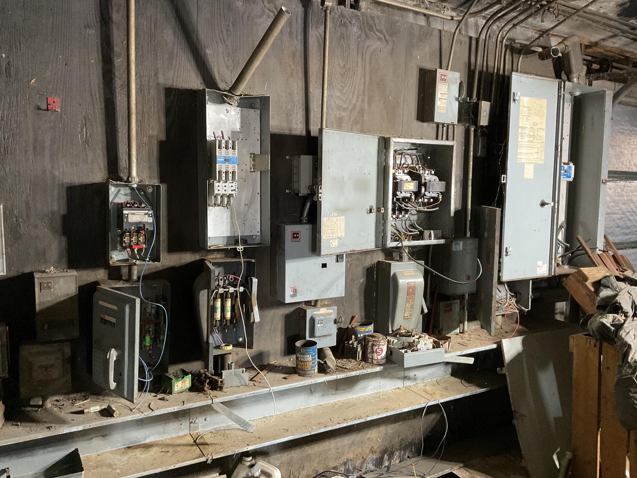 Control Panels and Breaker Boxes Mounted on 2 Walls, Located In Heuvelton, Ny.
