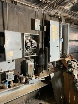 Control Panels and Breaker Boxes Mounted on 2 Walls, Located In Heuvelton, Ny.