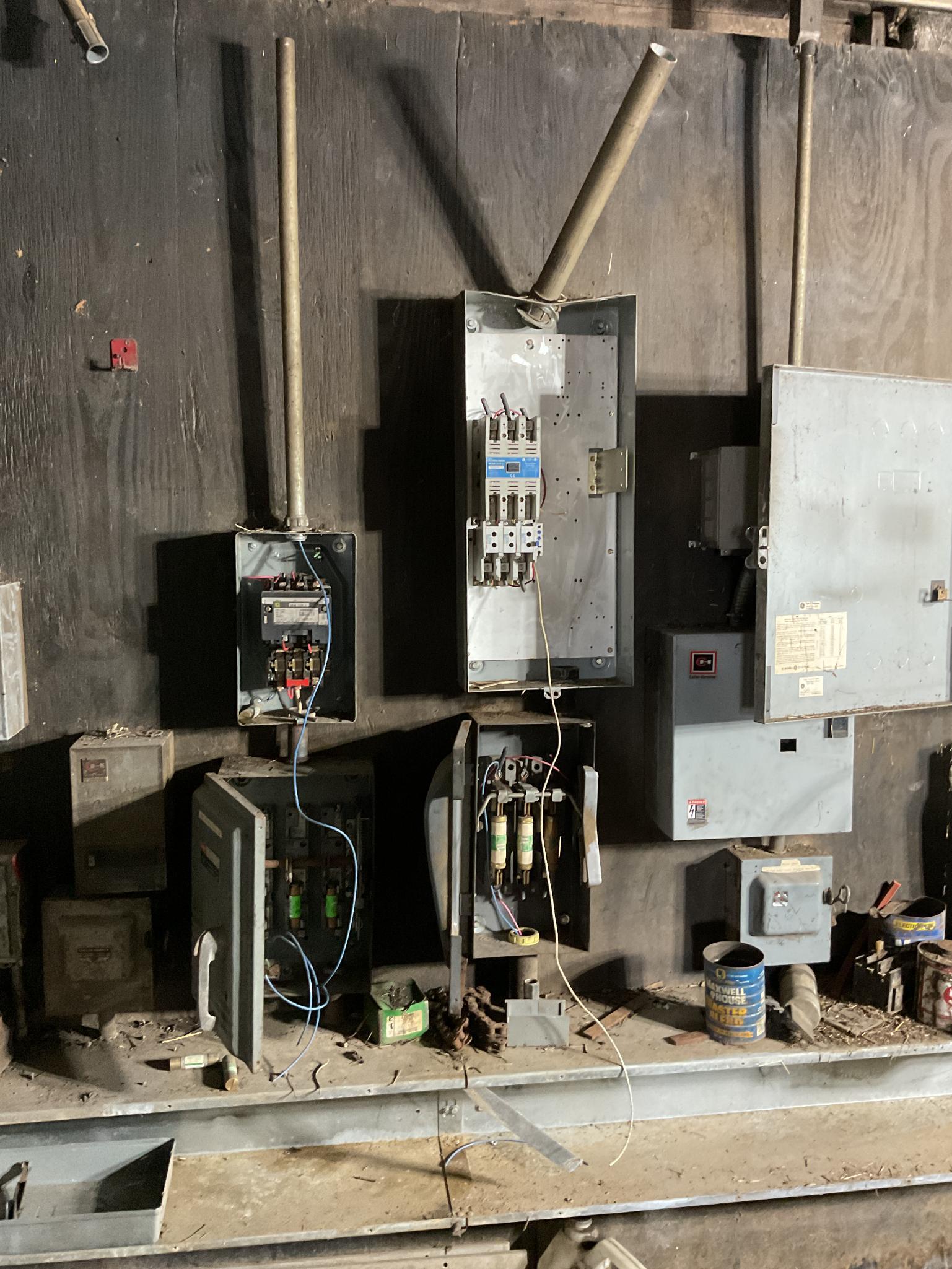 Control Panels and Breaker Boxes Mounted on 2 Walls, Located In Heuvelton, Ny.