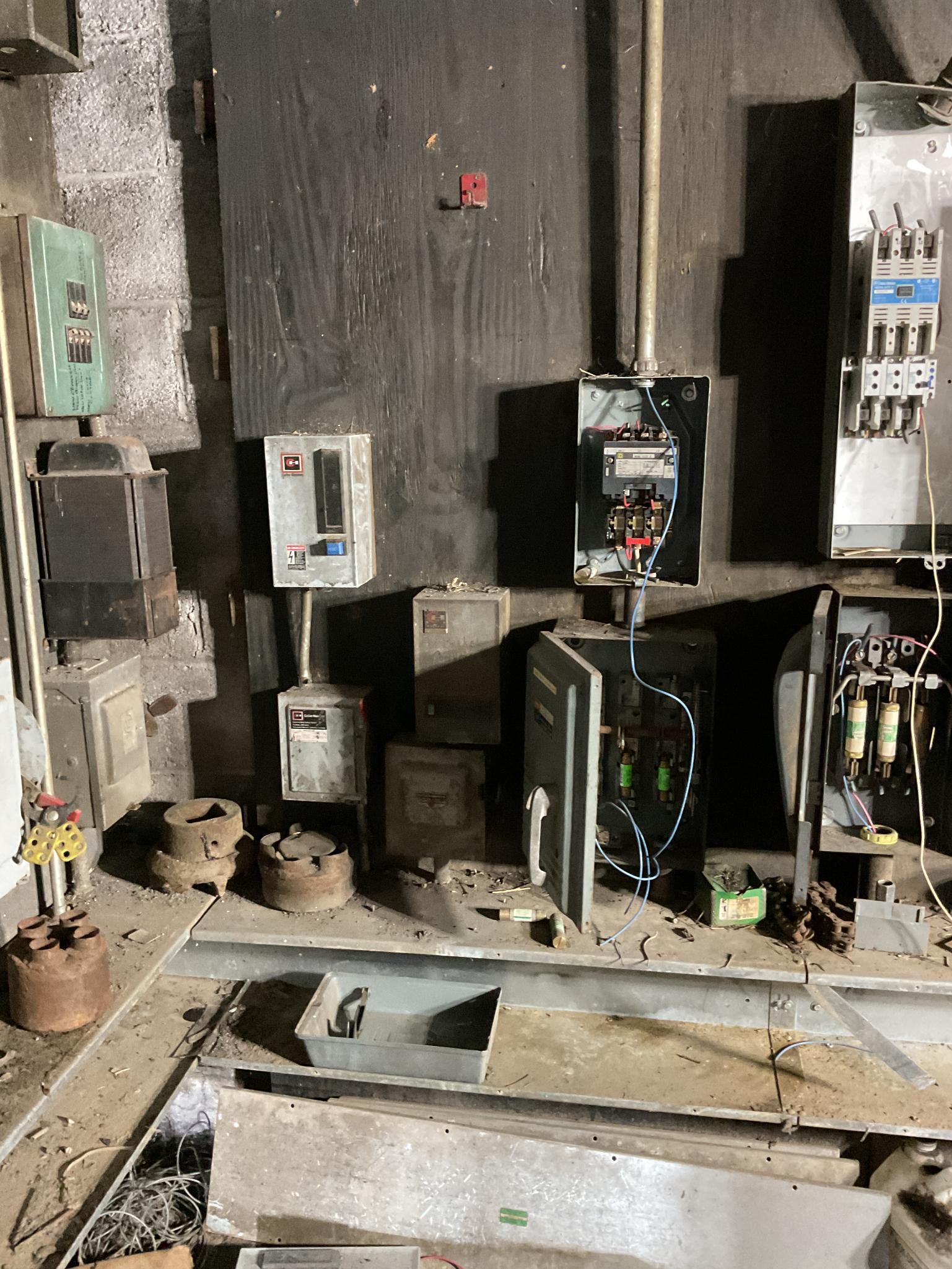 Control Panels and Breaker Boxes Mounted on 2 Walls, Located In Heuvelton, Ny.