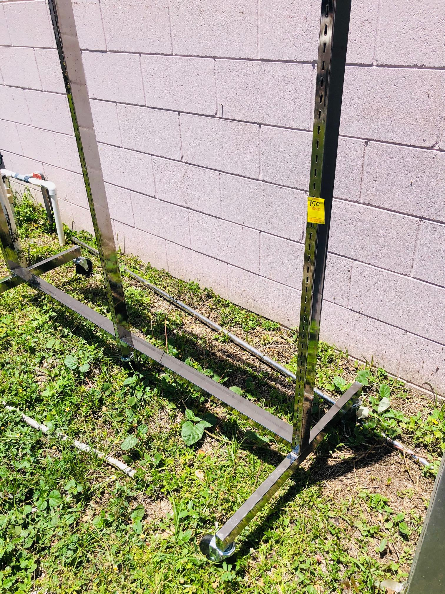CLOTHING RACK ON WHEELS, 5' X 5'