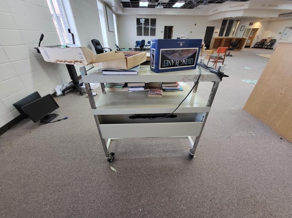 rolling metal cart w. books