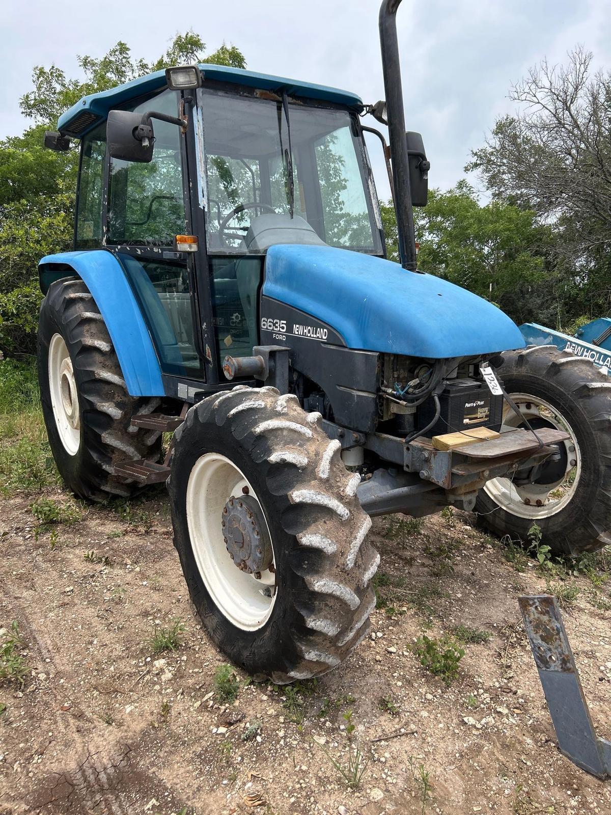 New Holland 6635 4WD Cab Tractor Comes with New Holland 7310 Loader and 6' Bucket and 3 Sets of