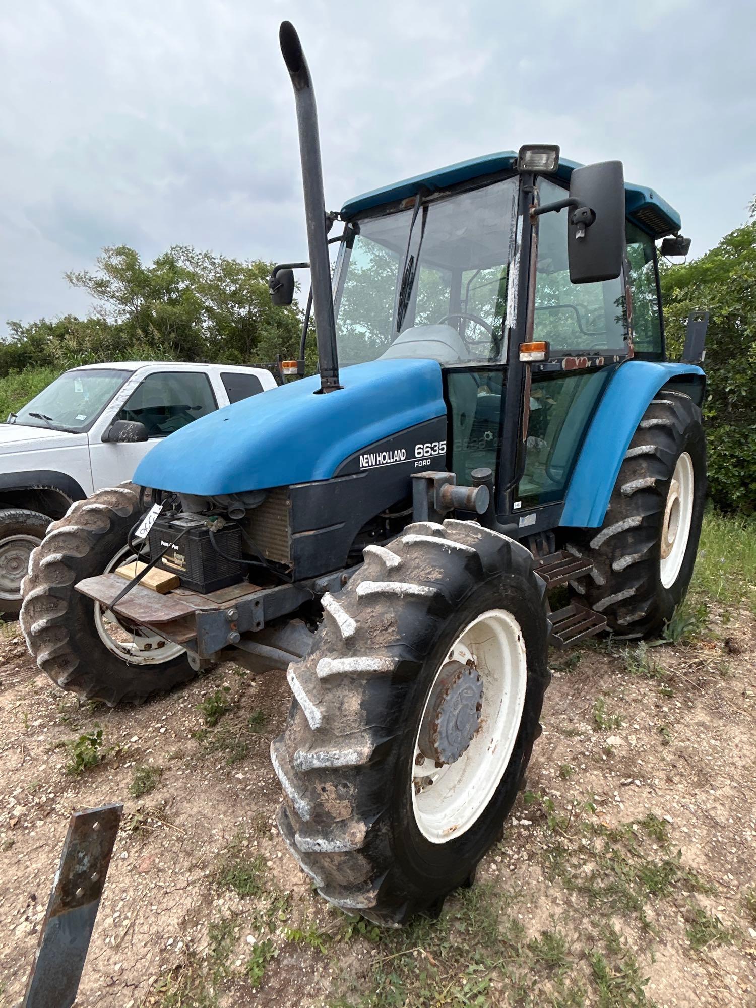 New Holland 6635 4WD Cab Tractor Comes with New Holland 7310 Loader and 6' Bucket and 3 Sets of