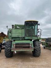 John Deere 7720 Combine with 24' Header and Header Trailer. Local farmer machine. Should be field