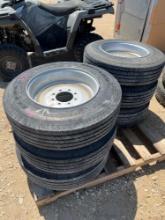 6 used 215/75R 17.5 trailer tires on 8 lug silver solid steel wheels. Pulled off auction trailer.
