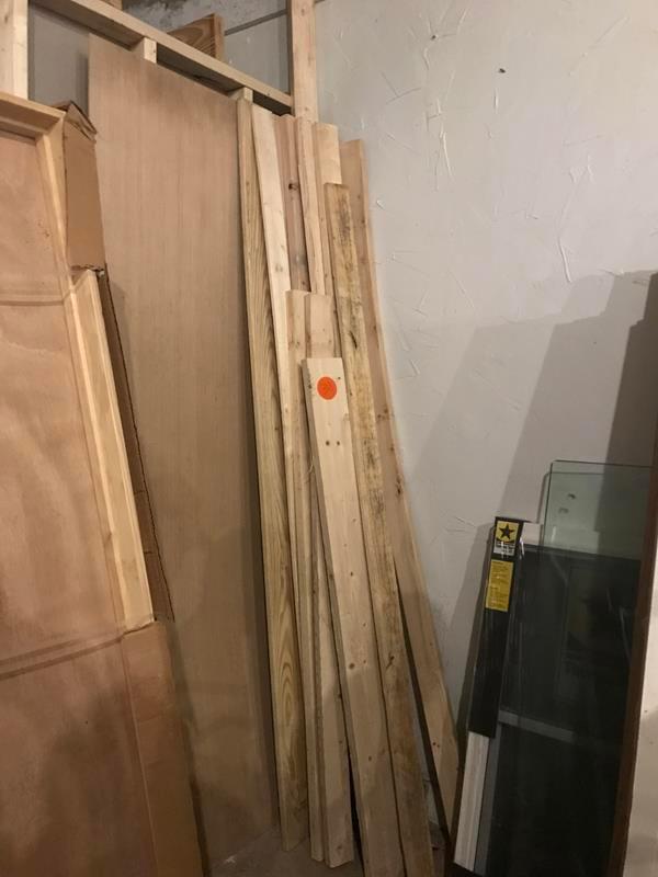 Stack of lumber (2x4s, 1x6s)