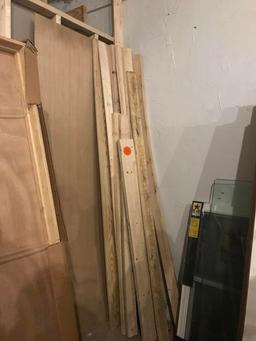 Stack of lumber (2x4s, 1x6s)