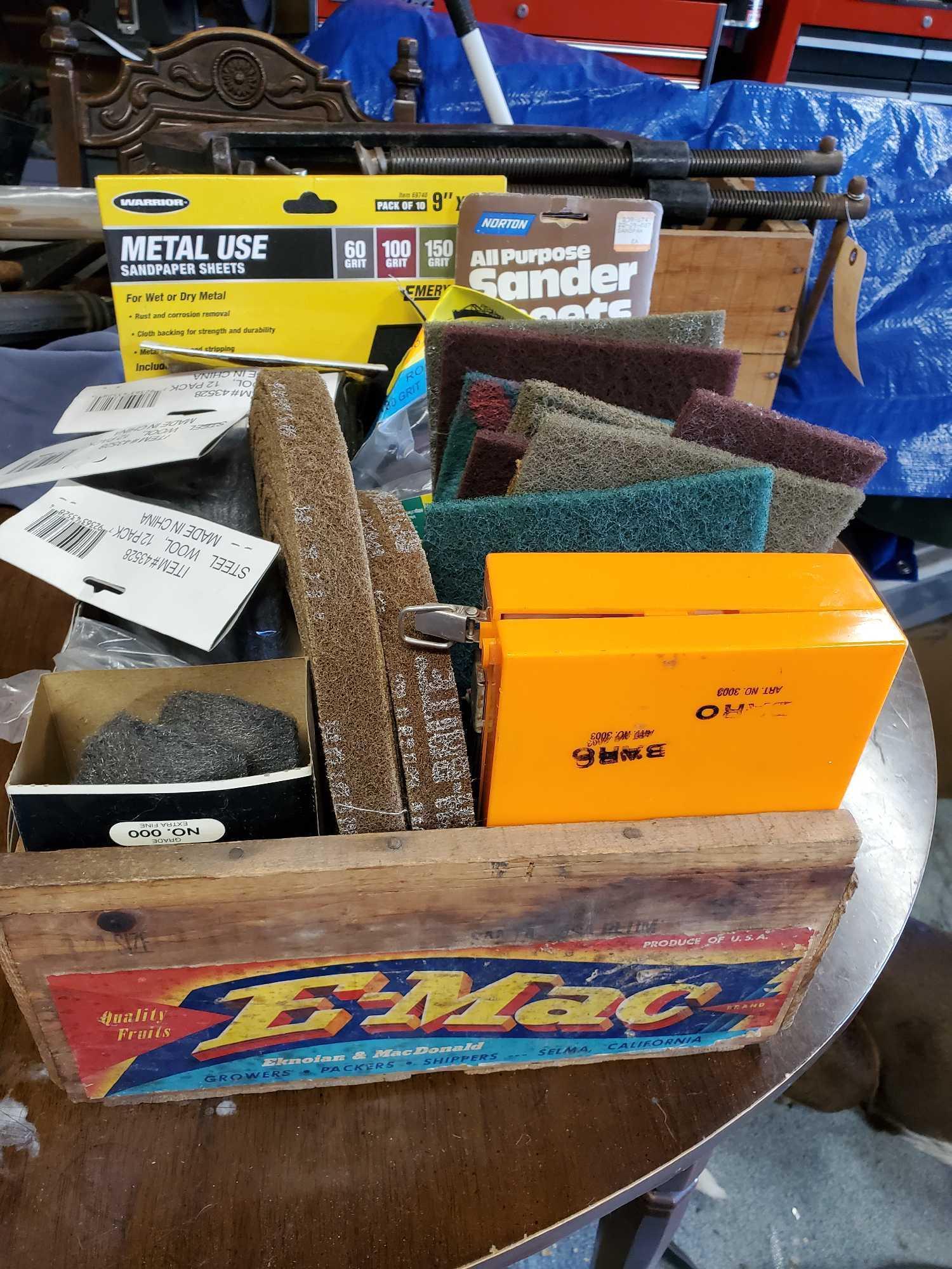 SCOTCH BRITE-SAND PAPER- SANDING DRUMS-STEEL WOOL AND EMORY CLOTH IN A WOOD CRATE