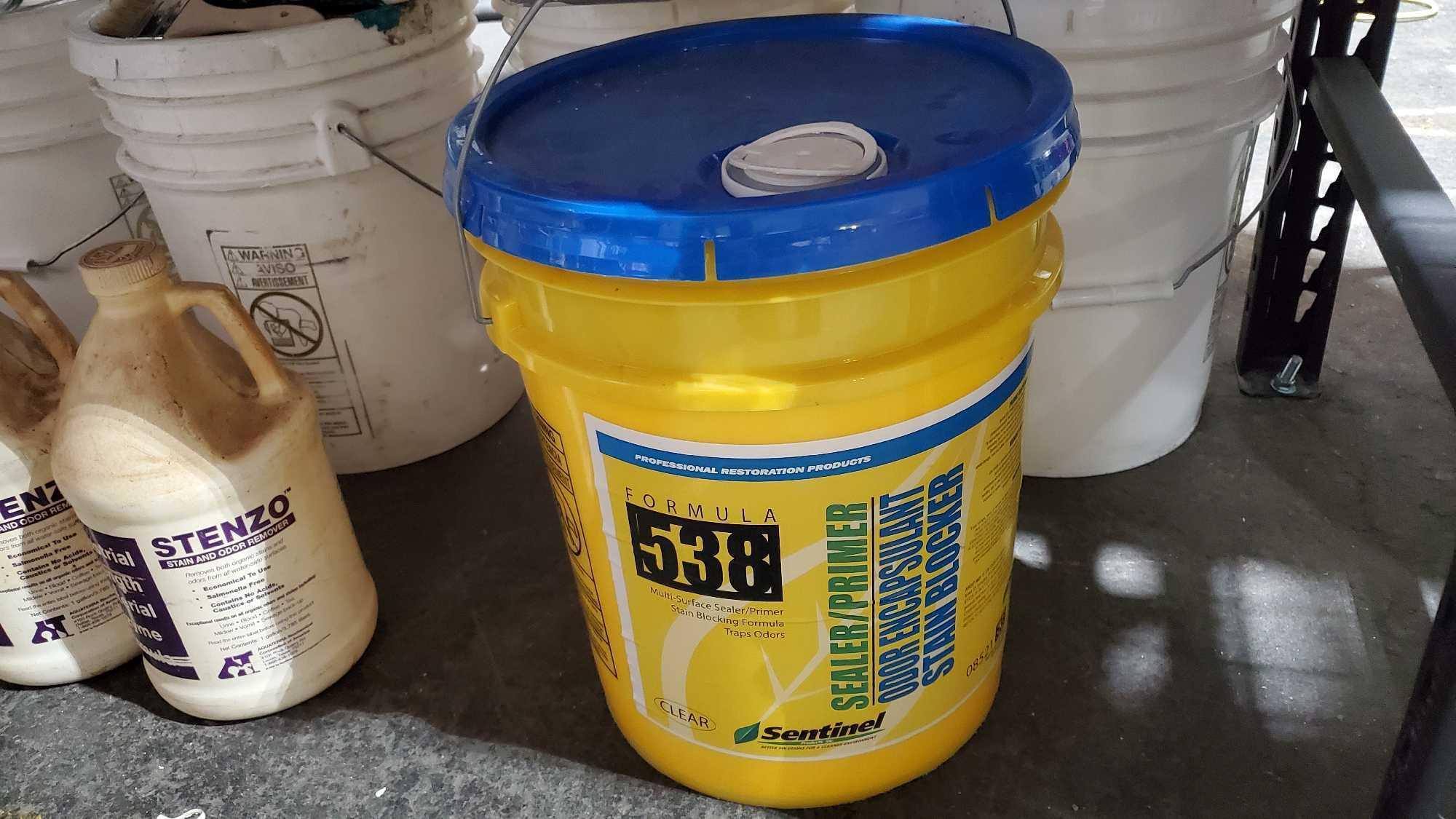 PAINT AND CHEMICAL CONTENTS UNDER SHELF