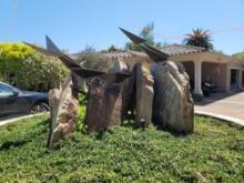 METALARTWORK WITH BIRDS AND STONE ROUNDABOUT AREA