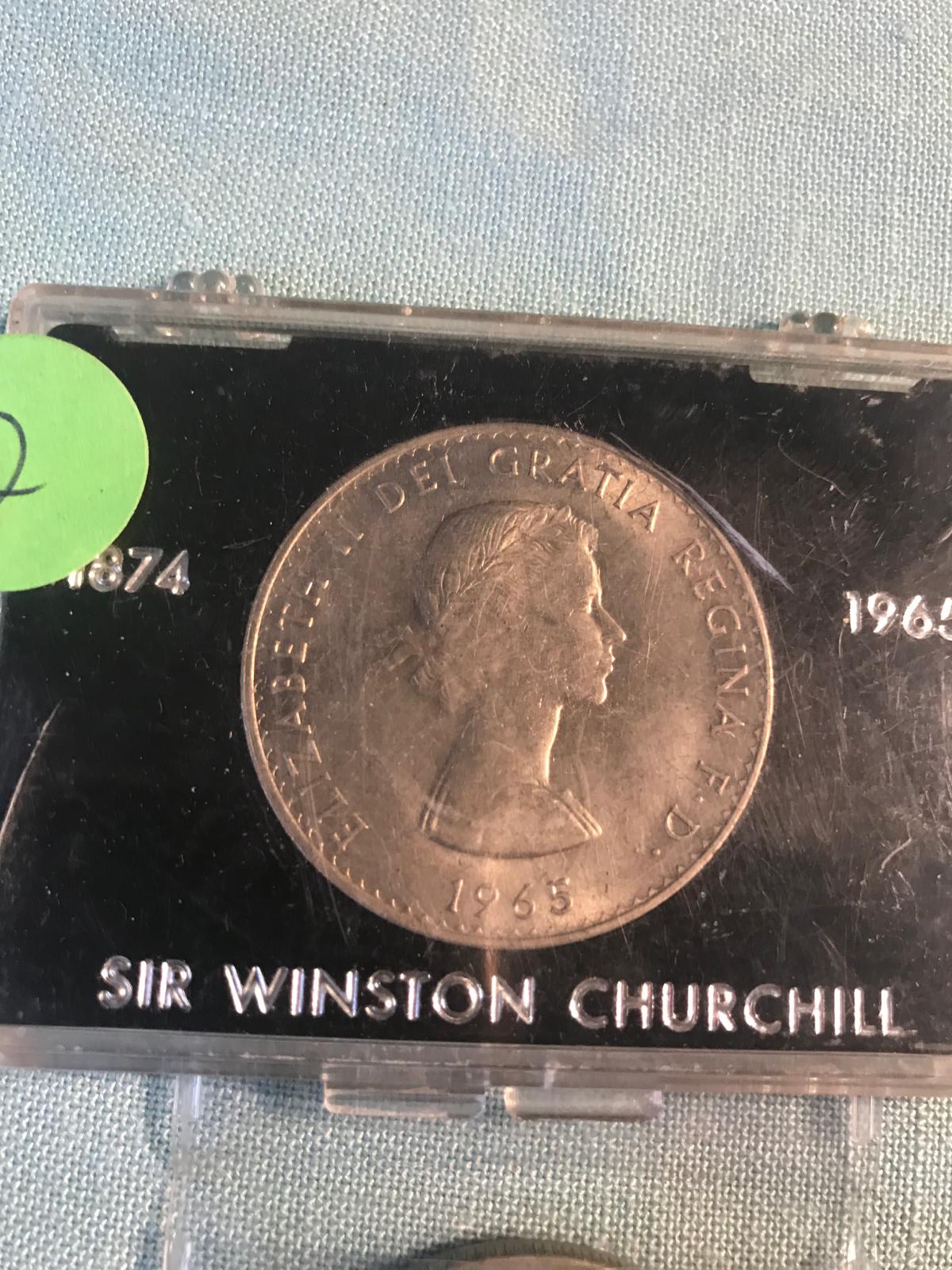 1965 Churchill Coin, and a One Maui Trade Dollar Comm coin